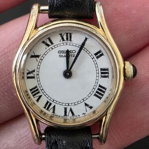 Seiko 1400-0029 Gold Tone Roman Numeral Petite 20mm 6J Watch For Parts Repair